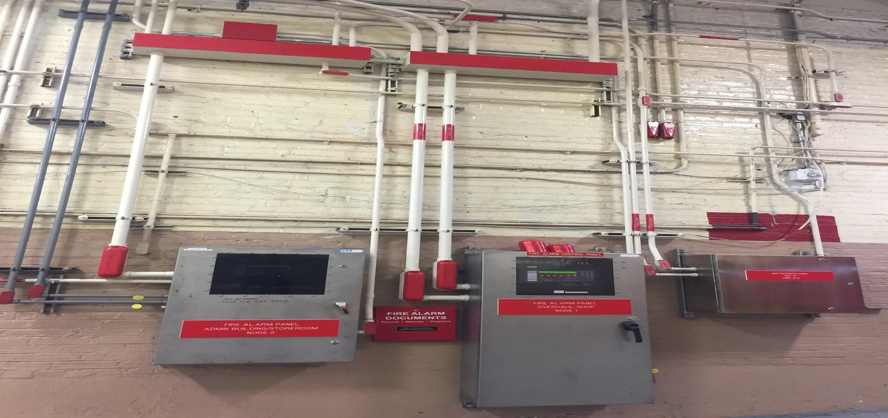 Fire alarm control equipment and red conduit installation